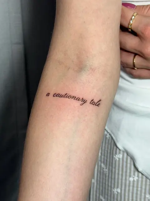 Short, clean lettering: “a cautionary tale.”